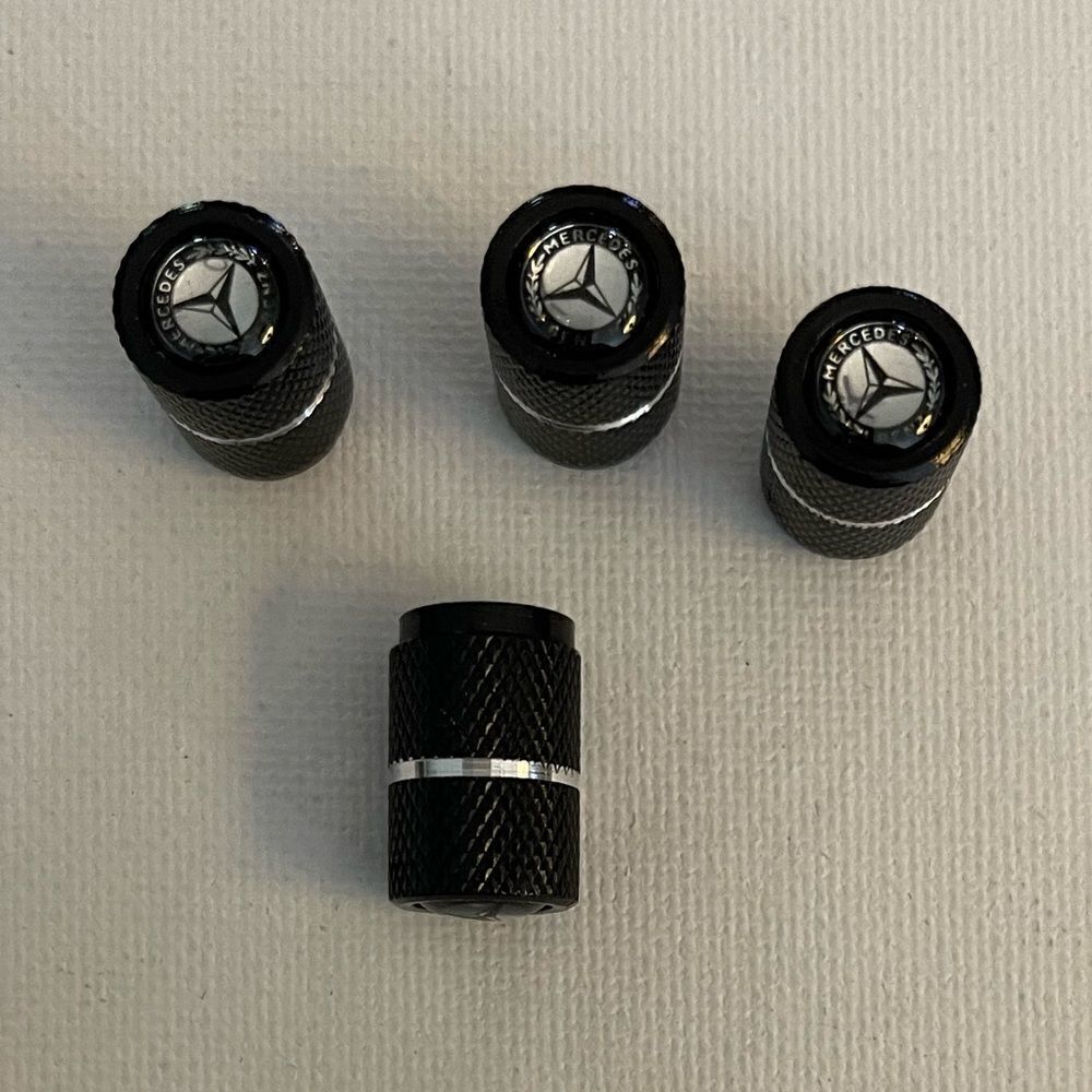 Mercedes Benz valve Stem caps in black with silver set of 4 NWT